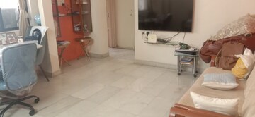 Living Room in 2 BHK Apartment at Satellite Garden, Goregaon East – for Sale