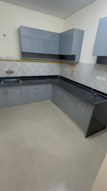 Kitchen in 2 BHK Apartment at Shri Radha Sky Gardens, Sector 16b Greater Noida – for Rent
