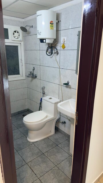 Bathroom in 2.5 BHK Apartment at Gulshan Botnia, Sector 144 – for Rent