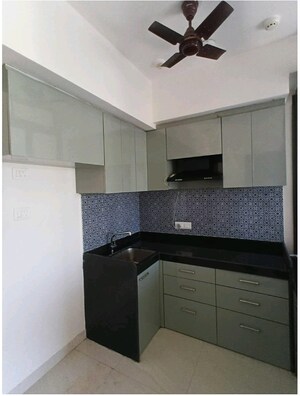 Kitchen in 1 BHK Apartment at Lodha Crown Quality Homes, Majiwada – for Rent