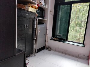 Bathroom in 1 BHK Apartment at Brahamand Phase 6 Chs Ltd, Brahmand – for Sale