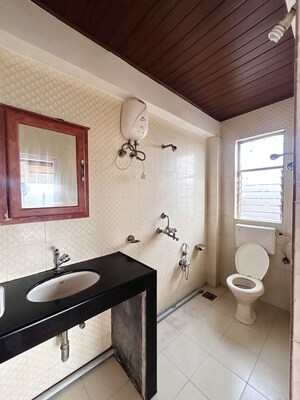 Bathroom in 3 BHK Apartment at Miramar – for Rent
