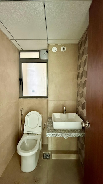 Bathroom in 1 BHK Apartment at Kalpataru Immensa, Kolshet Road – for Rent