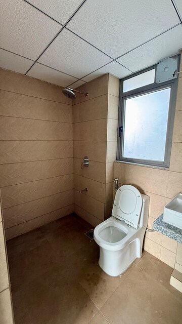 Bathroom in 1 BHK Apartment at Kalpataru Immensa, Kolshet Road – for Rent