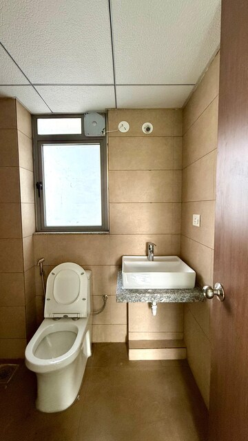 Bathroom in 1 BHK Apartment at Kalpataru Immensa, Kolshet Road – for Rent