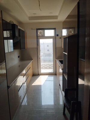 Kitchen in 3 BHK Builder Floor at Ansal API Esencia, Sector 67 – for Sale