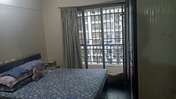 Bedroom in 2 BHK Apartment at Prajapati Lawns, Kharghar – for Rent