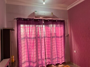 Bedroom in 2 BHK Apartment at K Raheja Heights, Malad East – for Rent