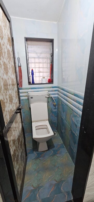 Bathroom in 1 BHK Apartment at Asmita Jyoti CHS, Malad West – for Rent