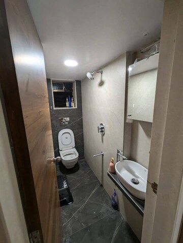 Bathroom in 1 BHK Apartment at Om Vighnaharta Tower, Virar West – for Rent