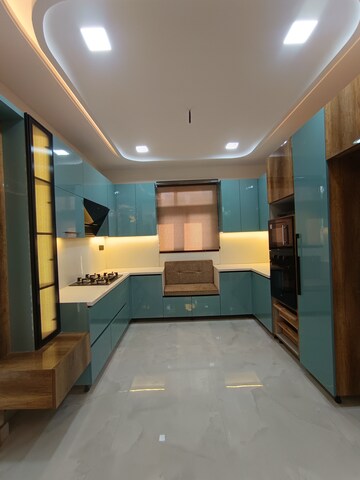 Kitchen in 4 BHK Builder Floor at Puri Aman Vilas, Sector 89 – for Sale