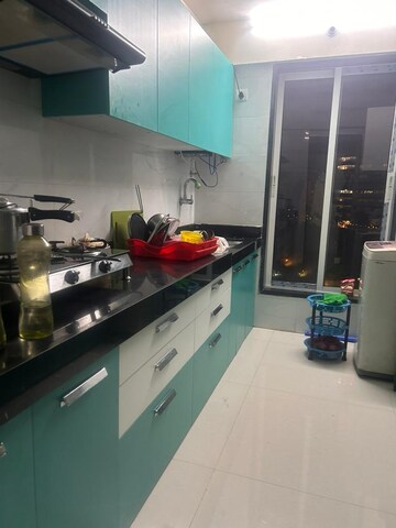 Kitchen in 2 BHK Apartment at Karmvir Avant Sky Villa, Goregaon East – for Rent