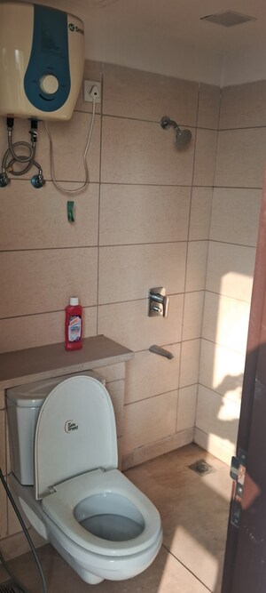 Bathroom in 2 BHK Apartment at Shapoorji Pallonji Joyville Phase 2, Sector 102 – for Rent
