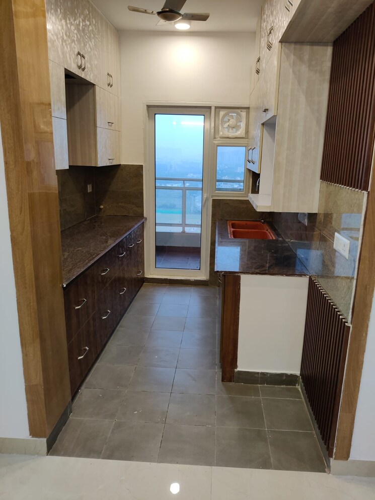Kitchen, aba-ivy-county 3.5 Bedroom 2124 Sq.Ft. Apartment In Sector 75 Noida 9577935