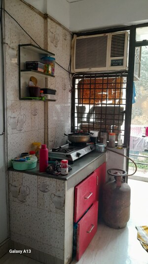 Kitchen in 1 RK Builder Floor at Mahindra Aura, Sector 110a – for Rent