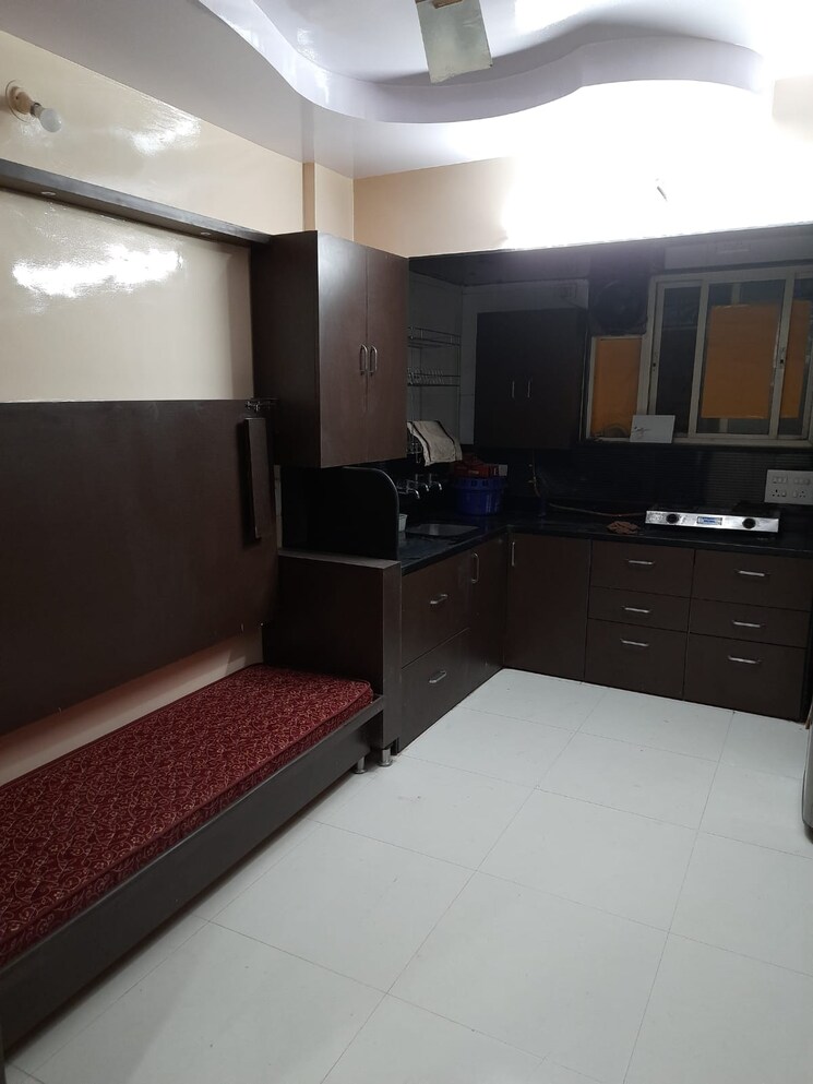 Kitchen, anchorage-apartment 1 Bedroom 595 Sq.Ft. Apartment In Lulla Nagar Pune 9577983