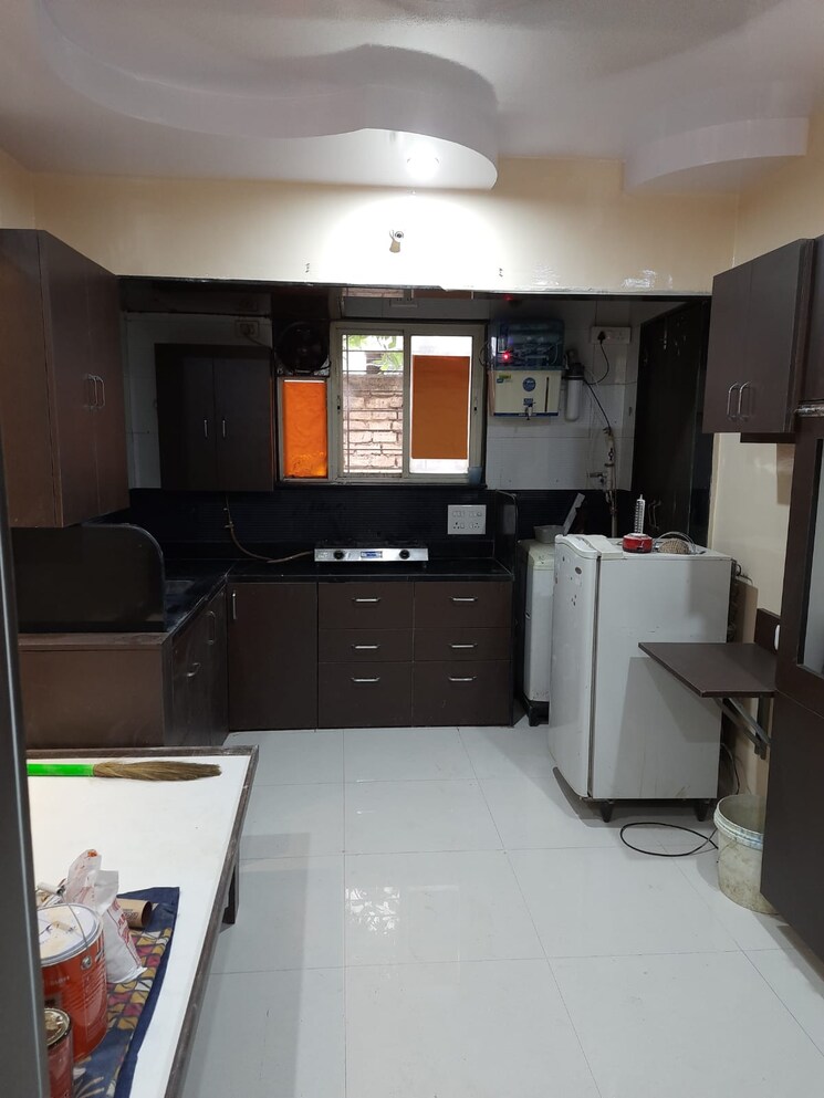 Kitchen, anchorage-apartment 1 Bedroom 595 Sq.Ft. Apartment In Lulla Nagar Pune 9577983