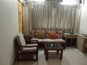 Living Room in 1.5 BHK Apartment at Sun N Dew Apartment, Santacruz East – for Rent