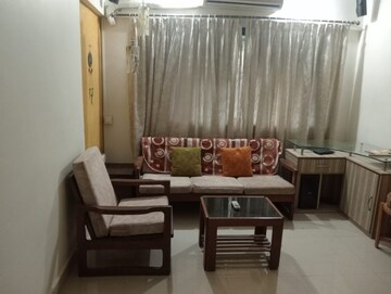 Living Room in 1.5 BHK Apartment at Sun N Dew Apartment, Santacruz East – for Rent