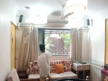 Living Room in 1.5 BHK Apartment at Sun N Dew Apartment, Santacruz East – for Rent