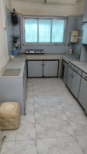 Kitchen in 2 BHK Apartment at Patel Park Society, Santacruz East – for Rent