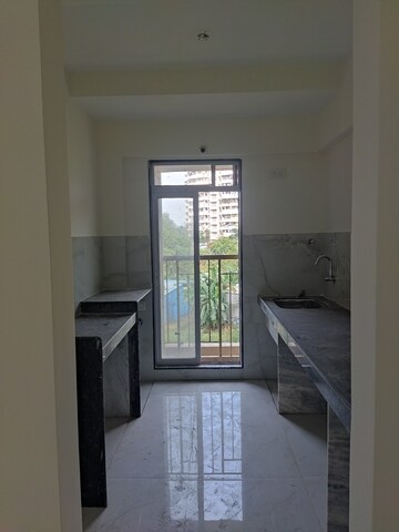 Living Room in 1 BHK Apartment at Metropolis Bayside, Kasarvadavali – for Sale