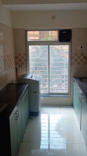 Kitchen in 2 BHK Apartment at Bindra Complex, Andheri East – for Rent