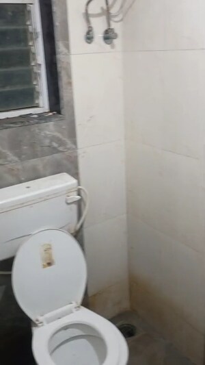 Bathroom in 2 BHK Apartment at Bindra Complex, Andheri East – for Rent