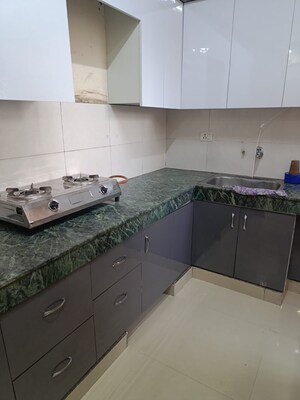 Kitchen in 2 BHK Apartment at Adore Happy Homes Grand, Sector 85 – for Sale