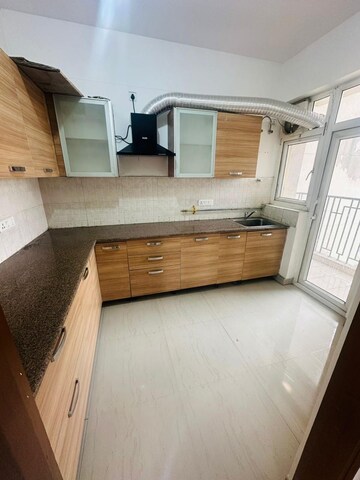 Kitchen in 3 BHK Apartment at T And T Eutopia Phase 1, Siddharth Vihar – for Sale