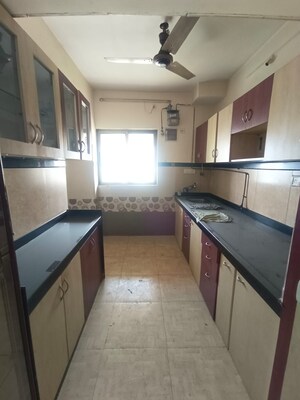Kitchen in 3 BHK Apartment at Twinkle Towers CHS, Kailash Nagar – for Sale