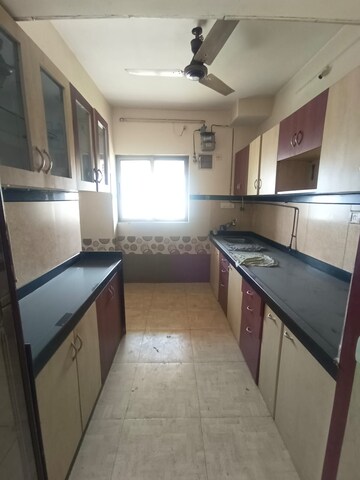 Kitchen in 3 BHK Apartment at Twinkle Towers CHS, Kailash Nagar – for Sale