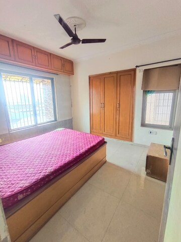 Bedroom in 3 BHK Apartment at Twinkle Towers CHS, Kailash Nagar – for Sale