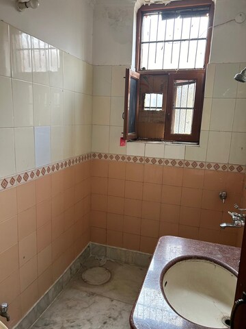 Bathroom in 2 BHK Builder Floor at Sector 23a – for Rent