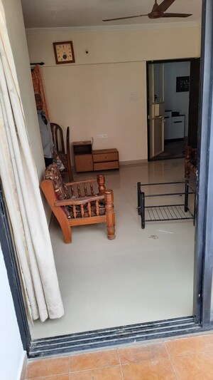 Living Room in 2 BHK Apartment at Guru Ganesh Nagar Society, Kothrud – for Rent