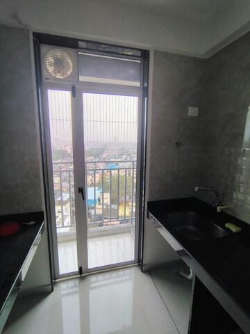 Building Lobby in 2 BHK Apartment at Ajmera Crosstown One, Kalyan West – for Rent