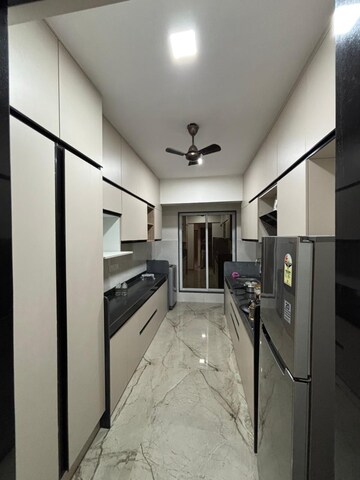 Kitchen/pantry in 3 BHK Apartment at Shrusti Saroj Sadan CHS, Naupada – for Rent