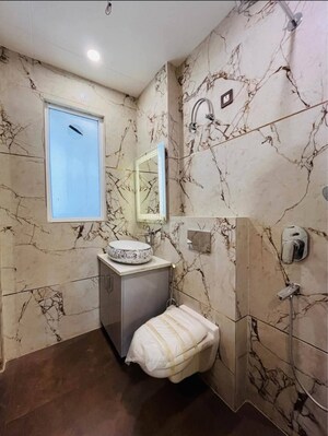 Bathroom in 4 BHK Builder Floor at Ansal API Esencia, Sector 67 – for Sale