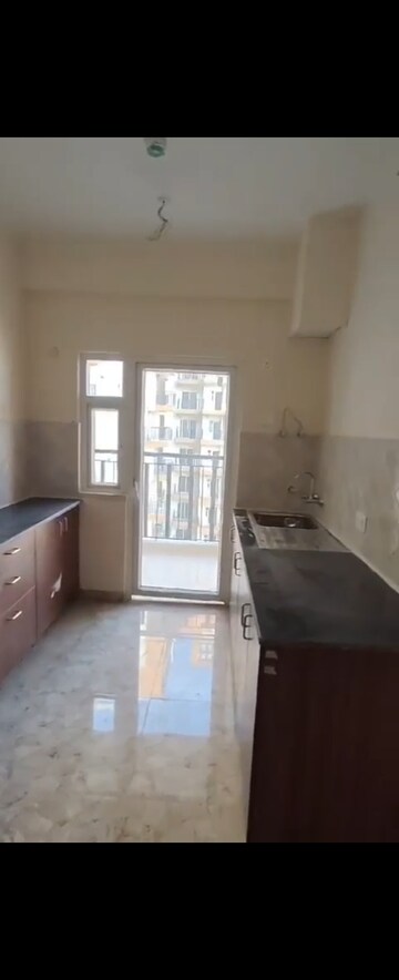 Kitchen in 4 BHK Apartment at VVIP Addresses, Raj Nagar Extension – for Sale