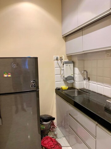Kitchen in 1 BHK Apartment at Candy Castle, Colaba – for Rent