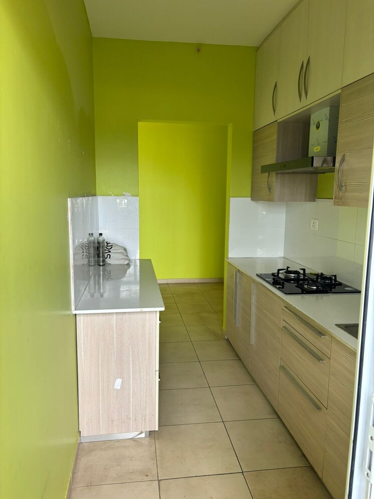 Kitchen, bhartiya-nikoo-homes 1.5 Bedroom 965 Sq.Ft. Apartment In Thanisandra Main Road Bangalore 9578838