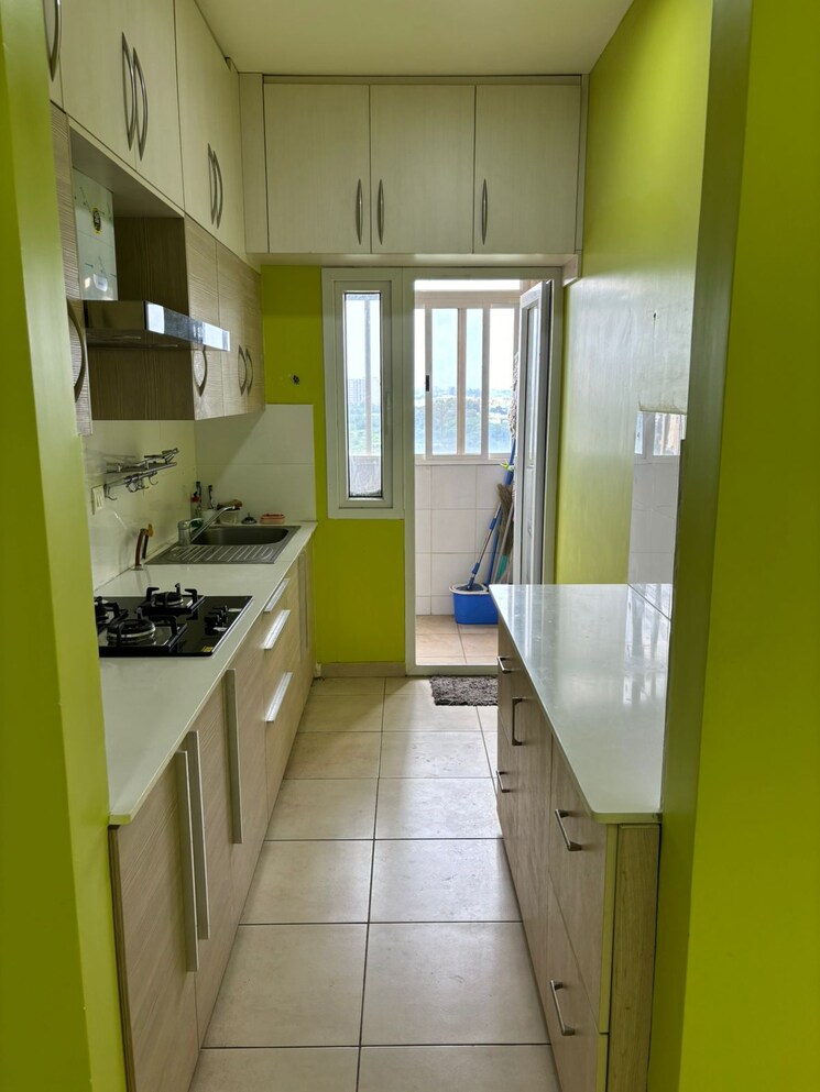 Kitchen, bhartiya-nikoo-homes 1.5 Bedroom 965 Sq.Ft. Apartment In Thanisandra Main Road Bangalore 9578838