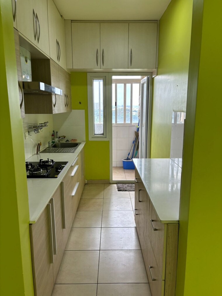 Kitchen, bhartiya-nikoo-homes 1.5 Bedroom 965 Sq.Ft. Apartment In Thanisandra Main Road Bangalore 9578838