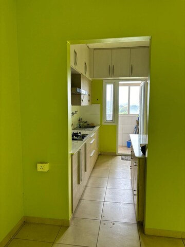 Kitchen in 1.5 BHK Apartment at Bhartiya Nikoo Homes, Thanisandra Main Road – for Rent