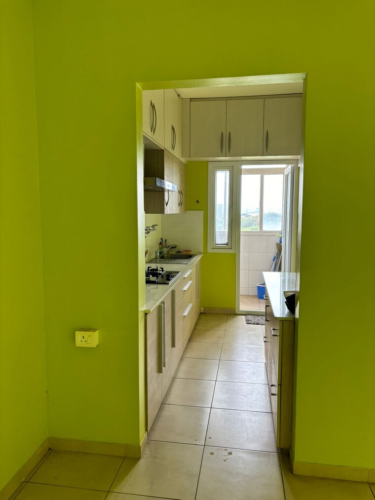 Kitchen, bhartiya-nikoo-homes 1.5 Bedroom 965 Sq.Ft. Apartment In Thanisandra Main Road Bangalore 9578838