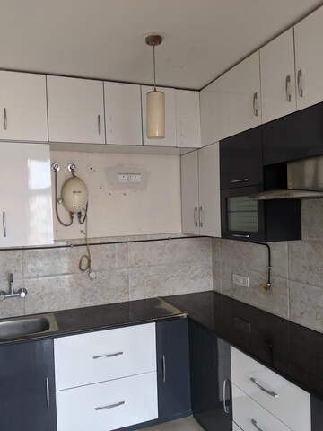 Kitchen in 2 BHK Apartment at Jaypee Greens Pavilion Court, Sector 128 – for Rent