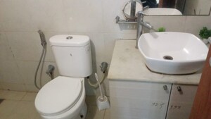 Bathroom in 3 BHK Apartment at Bhartiya Nikoo Homes, Thanisandra Main Road – for Rent