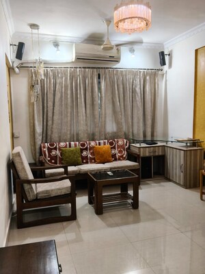 Living Room in 1.5 BHK Apartment at Kalina – for Rent