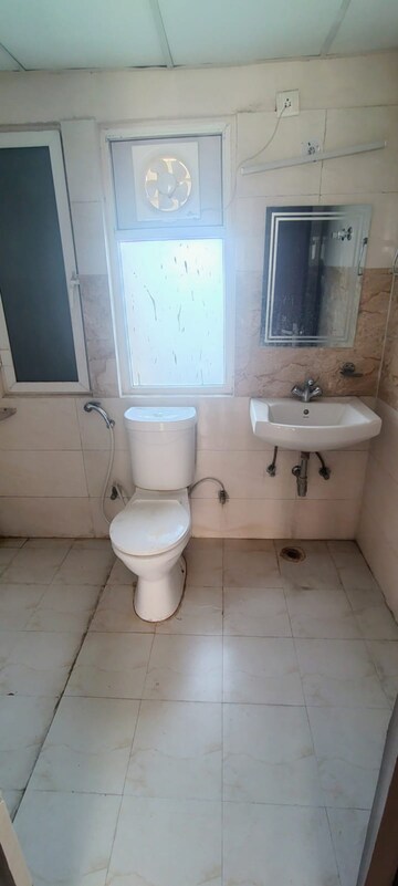 Bathroom in 3 BHK Apartment at Amrapali Golf Homes, Sector 4 Greater Noida – for Rent