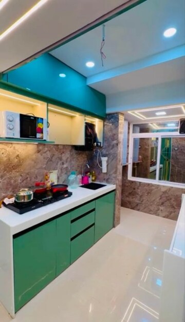 Kitchen in 1 BHK Apartment at Sunteck Maxxworld 2, Naigaon East – for Sale